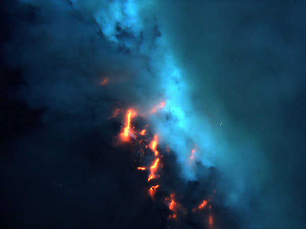 This is a side-view of an eruptive area, with magma and rock fragments cascading down the volcanos slope. This image is approximately nine feet across. 