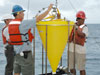 Crew of the RV Ron Brown deploying sediment trap.