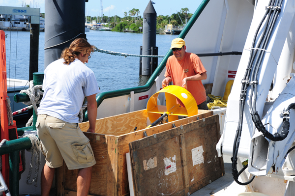 Crew lifting the Towfish