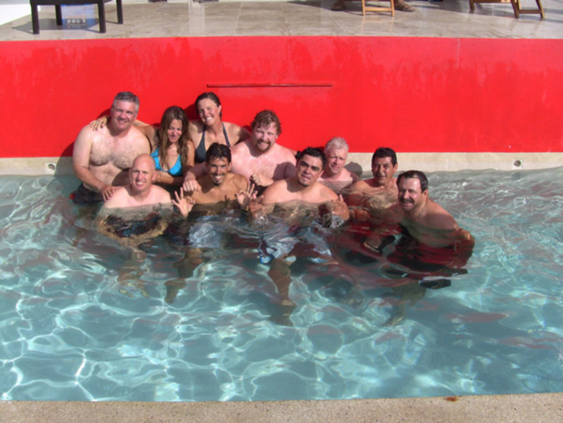 The scientific diving crew and the boat crew relax after two weeks of underwater survey and sample collection. From left: (back row) Loren Davis, Josiane Dalcourt, Amy Gusick, Clint Nelson, Andy Hemmings, (front row) Eric Hessel, Kaya Chotard, Valerio Alvarez, Noel Flores, Olegario Leon Alvarez.