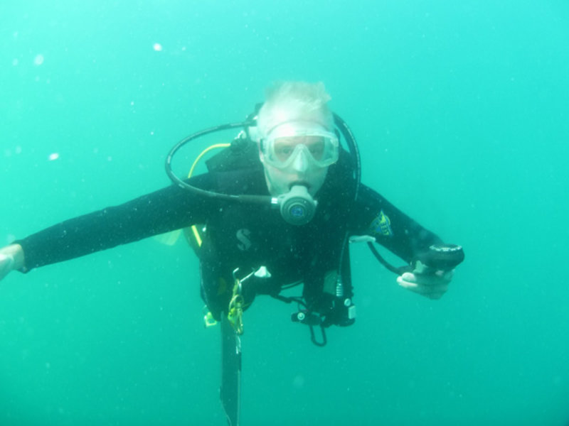 Andy Hemmings floats in the blue water of the Sea of Cortez while conducting his dive safety stop.