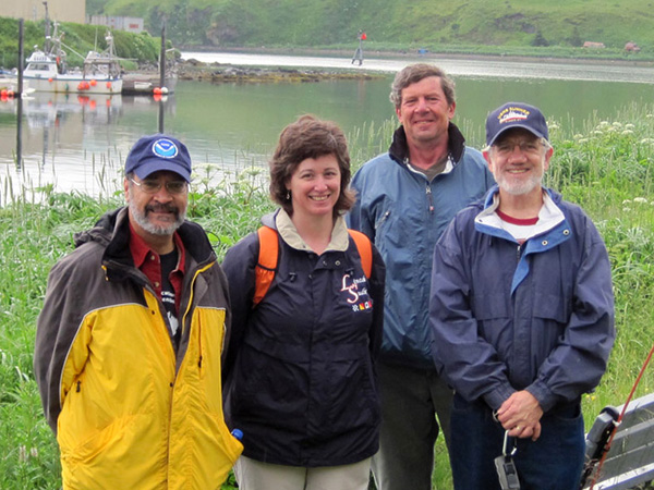 Andy Stevenson (second from right) has sailed out of Dutch Harbor many times on U.S. Geological Survey research cruises. He gave us an informal walking tour of Unalaska. Left to right: Pablo Clemente-Colón (National Ice Center), Caroline Singler (NOAA Teacher at Sea), Andy, and Jerry Hyman (National Geospatial-Intelligence Agency).