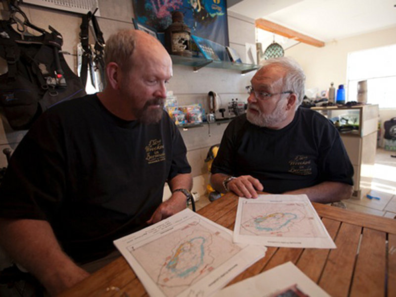 Tom Iliffe and Steve Blasco review targets and plan for taking geological samples at depth.