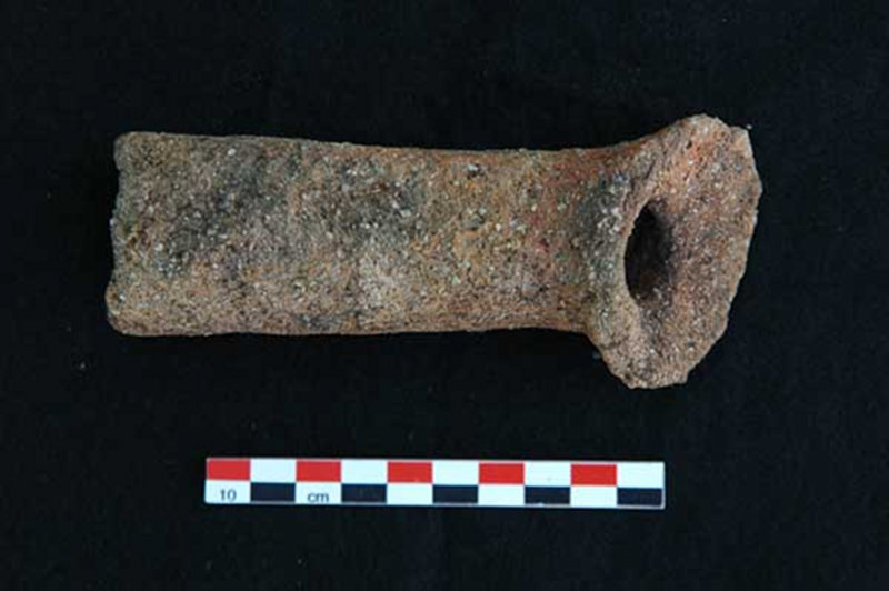 Located on the surface in the eastern part of the site, this artifact represents the handle of a censer.