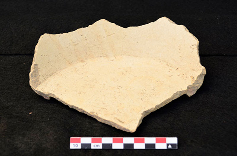 A cream-colored slate dish discovered during excavations was most likely produced in areas near Chichen Itza and Ek Balam, close to 150 km (~93 miles) southwest of Vista Alegre.