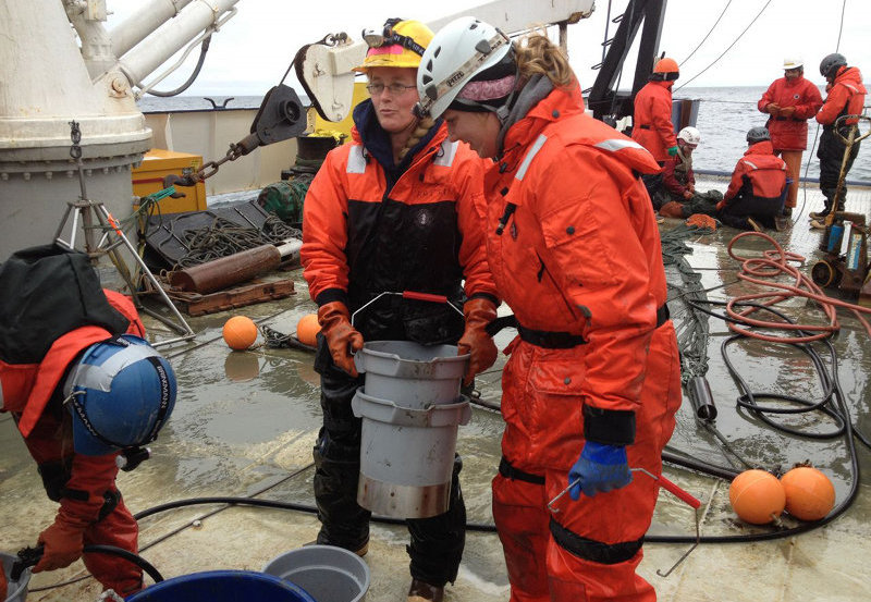 Katrin Iken and Lauren Bell preparing to sort trawl samples.
