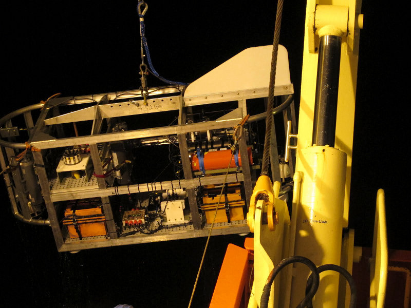 During this cruise, TowCam will be operated in concert with Sentry. As well as providing real-time imagery from the seafloor it is passing over, a novel adaptation for this cruise means the TowCam pilots will also have the opportunity to attempt sampling of any biological communities we find at any vent or seep sites.
