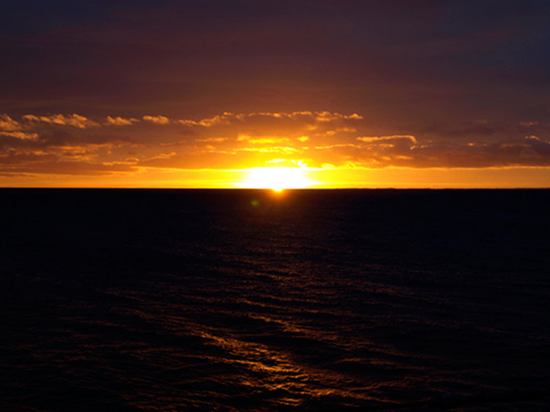 What a difference a day makes. Friday dawned (around 8:45am) with bright sunshine and smooth seas. We’ll take that for the next 10 days, please!