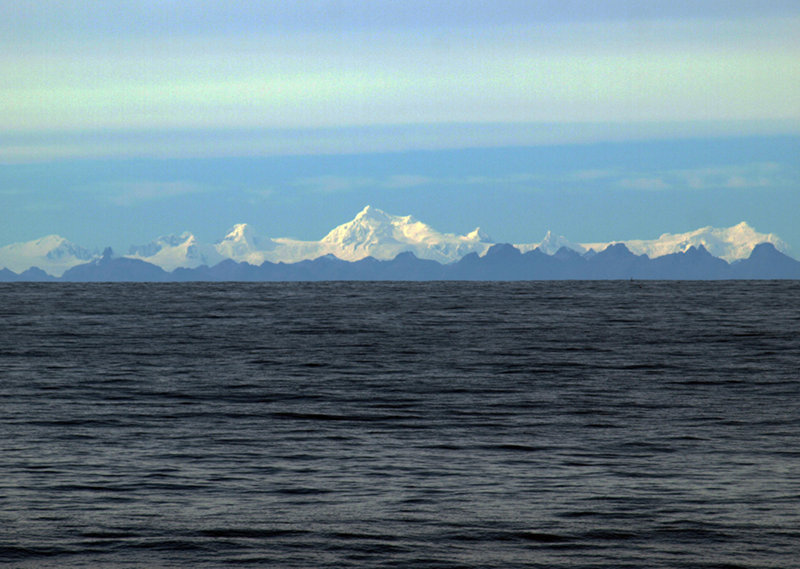 By early afternoon we were way off-shore and out in the open Pacific Ocean, proper. While the mountains in this photo are impressive, what is particularly good news for us on the ship is how flat and calm the seas are.
