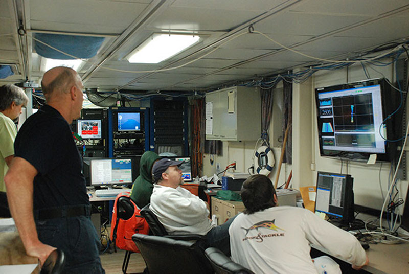 Scientists and crew aboard NOAA Ship Ronald H. Brown anxiously await the results of multibeam surveys, hoping to identify new shipwrecks.