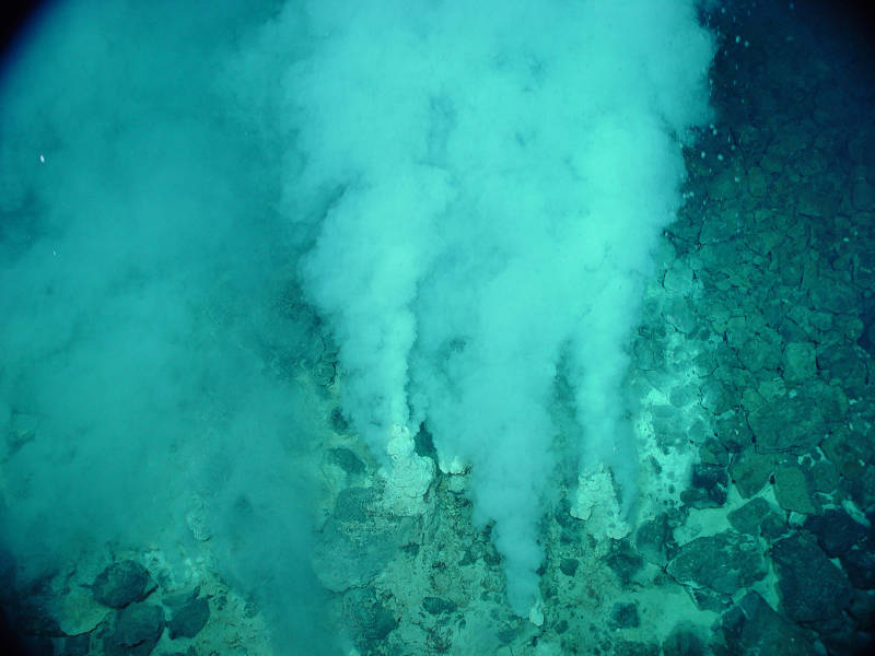 The Champagne vent field at NW Eifuku seamount emits droplets of liquid CO2 from the area around these white-smoker hydrothermal vents.