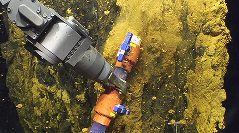 The scoop sampler allows the microbiologists to collect bulk samples of microbial mat, maintaining the integrity of the substrate the bacteria create and live within.