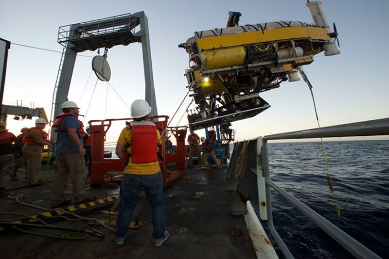 Members of the Nereus team and ship's crew recover Nereus to the deck of Thomas G. Thompson last week.