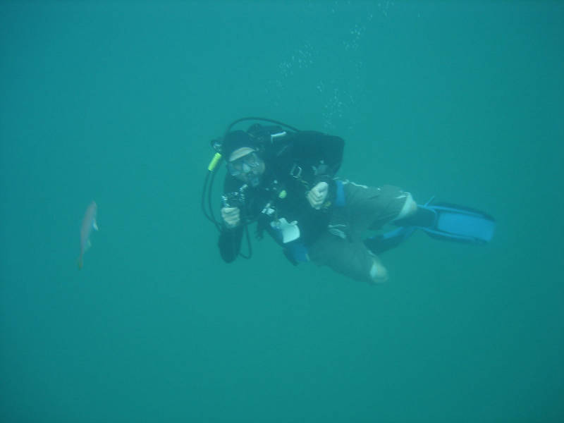 Chuck Meide dives with a small video camera to film the area we recently probed.
