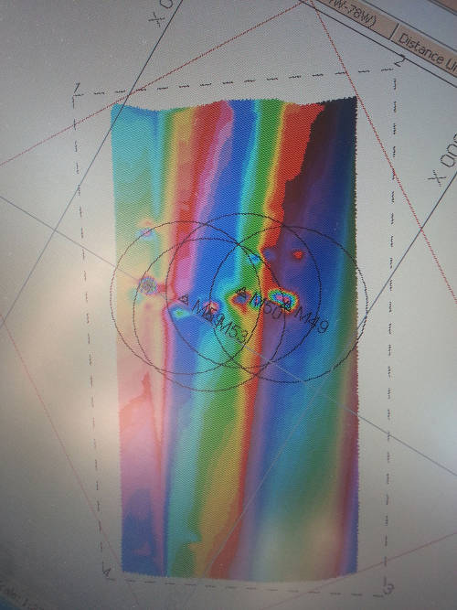 Target 1 consists of several magnetic anomalies, or variations from the Earth’s magnetic field. This is what we would expect to see of a scatter of iron artifacts buried in the sand from a historic shipwreck.