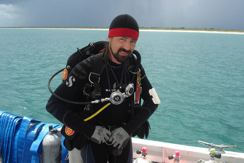 Here I am preparing to enter the water. A dark sky means we are expecting to cut the dive short due to a storm moving towards us.