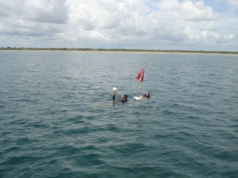 Chuck and I refine the accuracy of our drop buoy using the Trimble GPS receiver. This survey-grade satellite positioning system is accurate to within a meter.