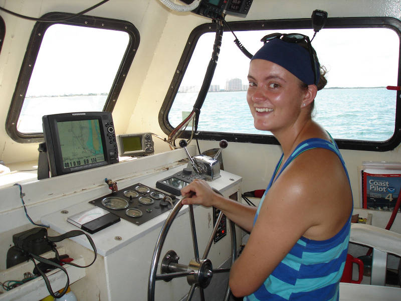 Olivia McDaniel driving the boat from Ponce Inlet south past New Smyrna Beach to the survey area.