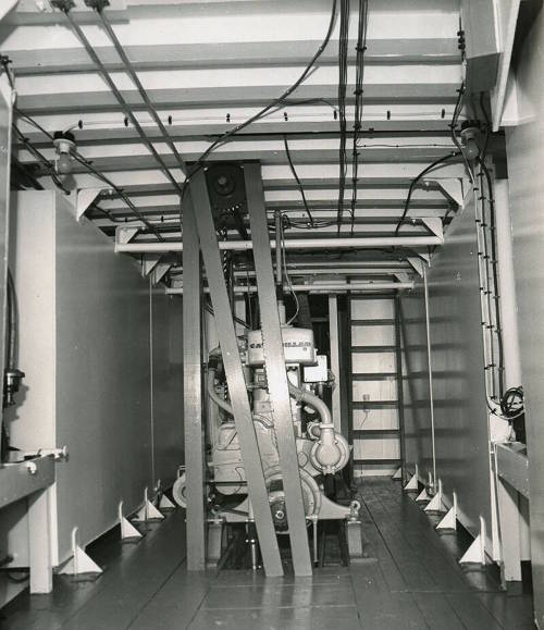 Here we see an example of what the fuel tank from target E3T may have looked like. This is the engine room of the shrimp boat Captain Frisky in 1961. It has four fuel tanks, two on each side. Note the elbow brackets on the top and bottom of the tanks. One of these ripping away from the tank in a wrecking event may have caused the hole visible on the tank from target E3T. 