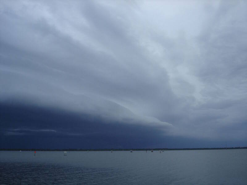 Dark clouds on the horizon mean a storm is coming.