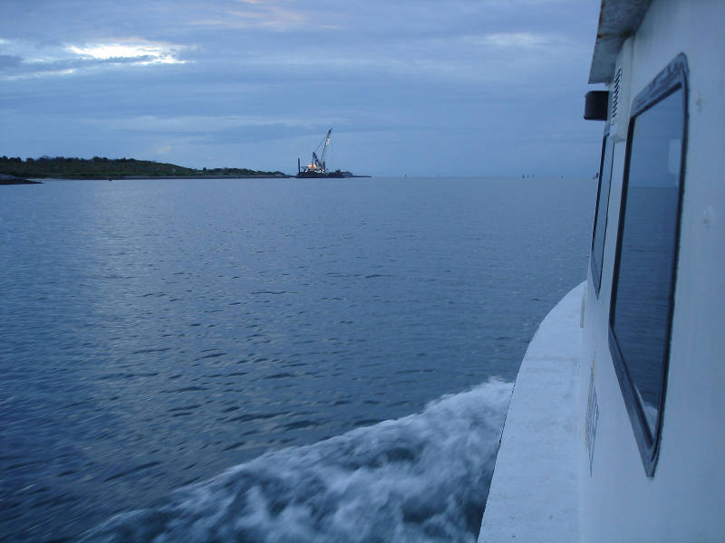 The research vessel <em>Roper</em> heads out to sea at dawn.