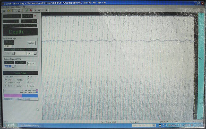 A view of the subbottom profiler laptop screen as it is collecting data today. The somewhat hazy, wavy horizontal line running across the upper portion of the screen is the profile of the seafloor below the boat.