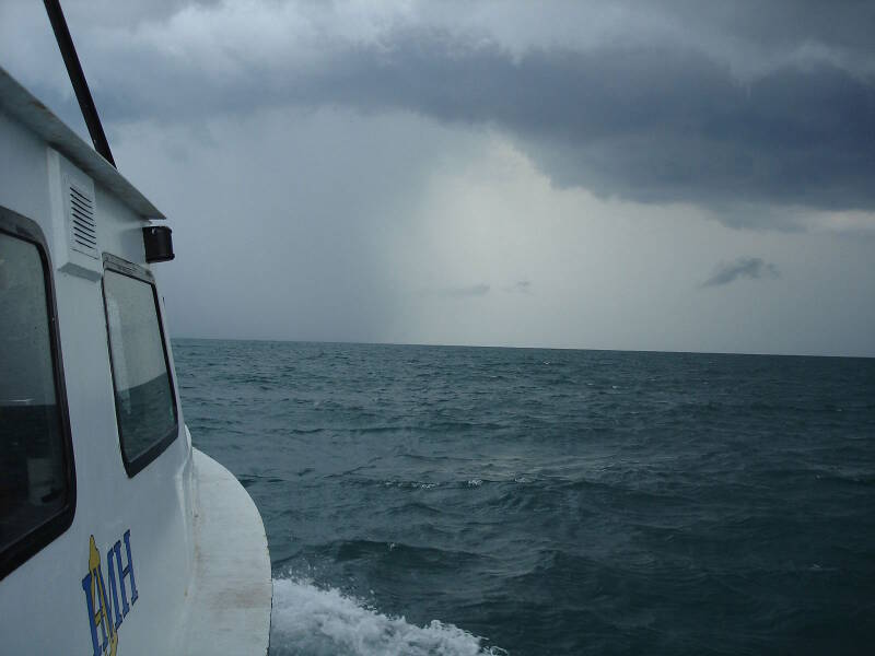 As the <em>Roper</em> heads home for St. Augustine, she weathers a late afternoon Florida thunderstorm, providing the boat and her crew with a nice freshwater rinse and cooler temperatures.