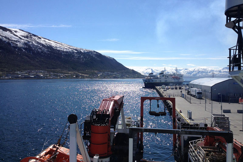 This image captures a glimpse from the ship’s bridge, facing the stern of the Johan Hjort on the day of departure in Tromsø, Norway.