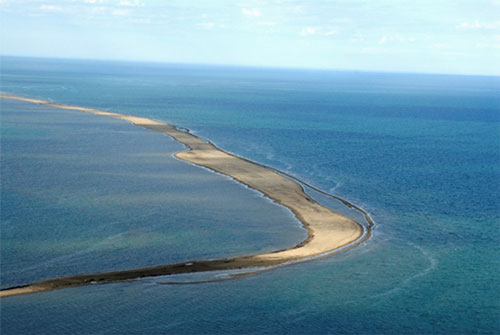 Approaching the Seahorse Islands from the southeast, the narrow islands are barren and sandy, providing some bird habitat in the summer months. The islands likely change shape and size through the winter months due to harsh arctic winds and ice pack movement.