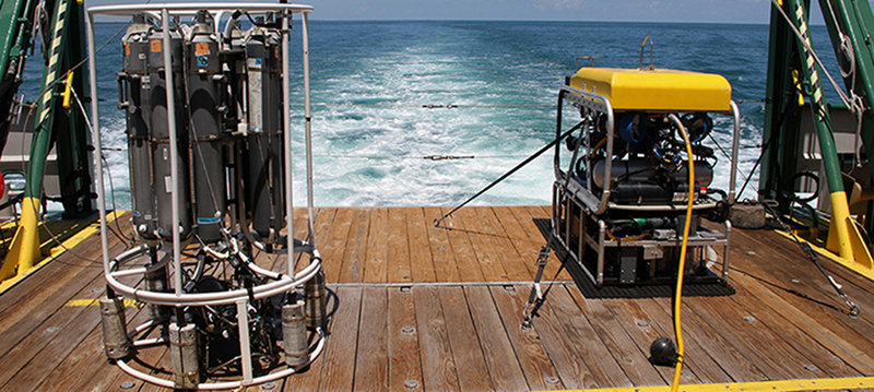 The Mohawk ROV (right) shares the deck with a CTD rosette. The ROV will be the workhorse of the mission, diving on Pulley Ridge up to 12 hours per day.
