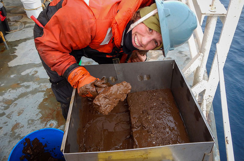 Angie Gastaldi measures and separates the different layers of the box core’s sample to prepare for sieving. Image courtesy of Angie Gastaldi, UAF, The Hidden Ocean 2016: Chukchi Borderlands.