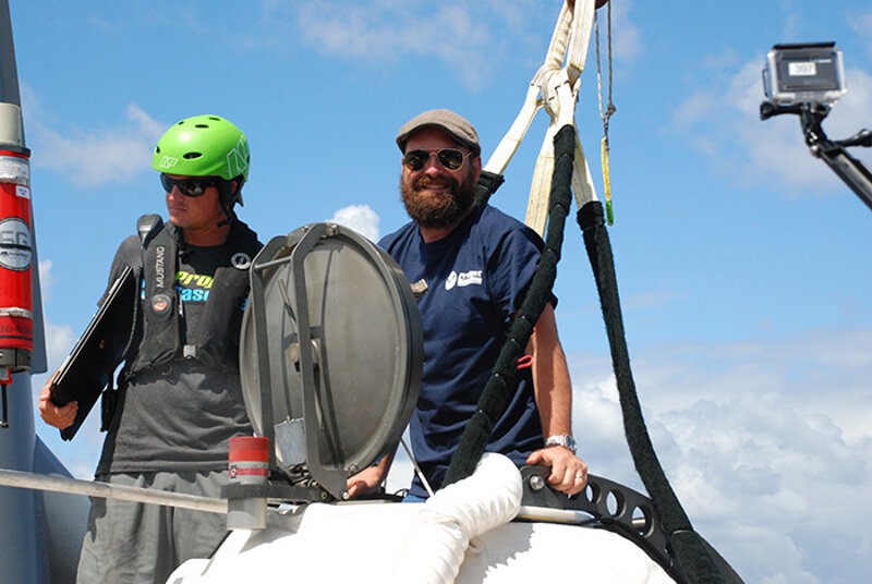 Joe Hoyt (right) getting into a submersible.