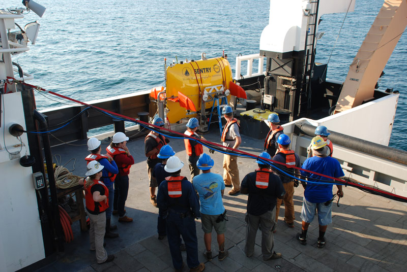 The AUV team and ship’s crew prepare to practice the launch and recovery of Sentry.