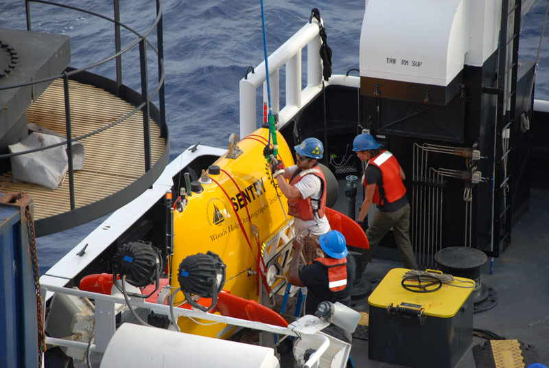 The AUV team prepares Sentry for deployment.