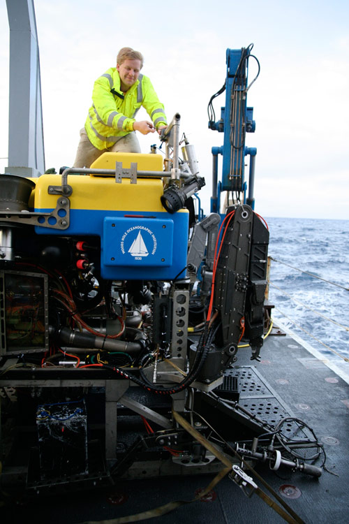 Carl, on his first cruise in 2010, works on remotely operated vehicle Jason aboard NOAA Ship Thompson.