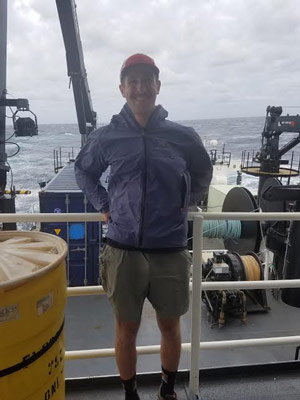 Will enjoys the wind from Hurricane Hermine on NOAA Ship Pisces.