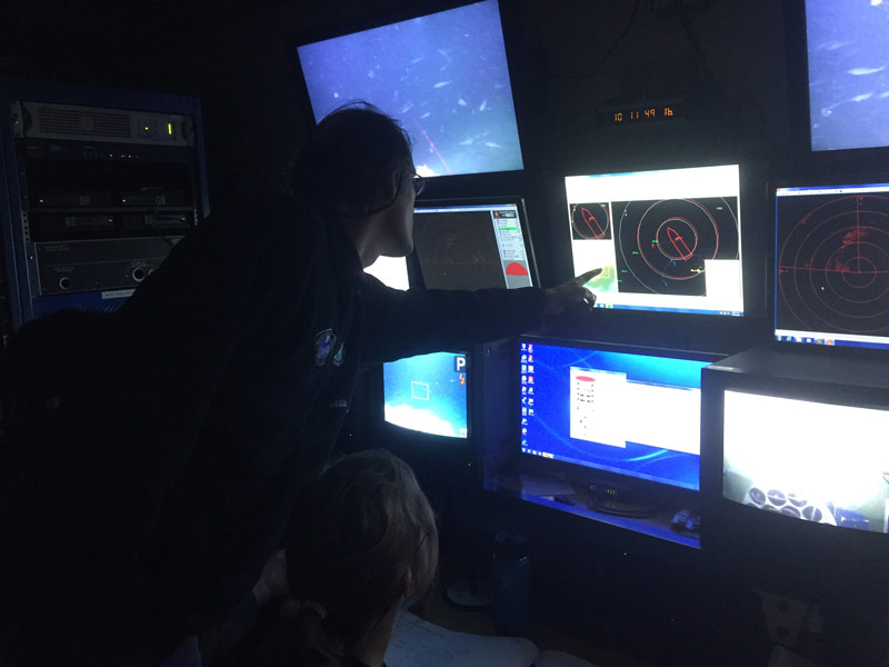 Guy Cochrane monitors the expedition from inside the control van.