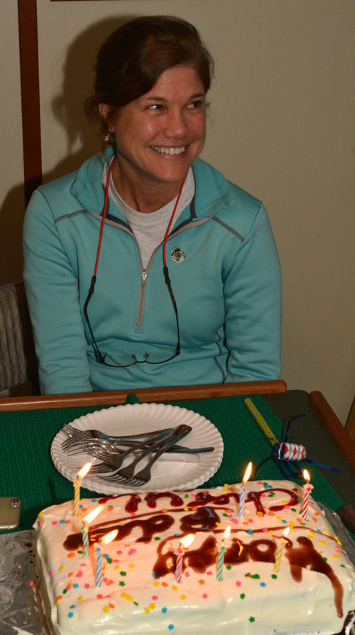 The birthday girl, Cheryl Morrison, with her specially made cake during our dinner celebration.