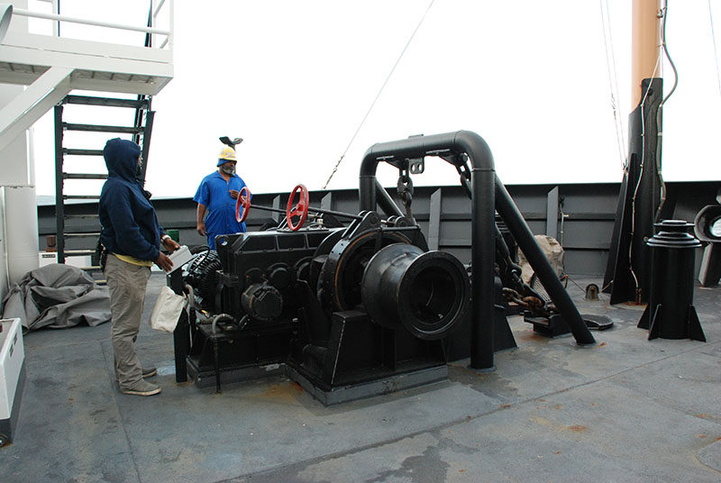 Lead Fisherman Cornell secures the anchor after the ship passes through the Chesapeake Bay Bridge-Tunnel.