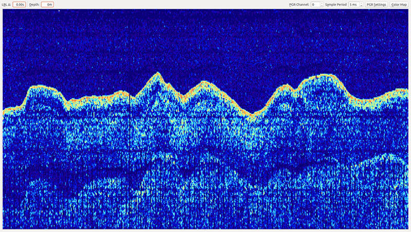 While Sentry primarily uses USBL (ultra-short baseline), it also uses a subset of a long baseline positioning system to determine the slant range to the vehicle. The ship sends a ping at 10.5khz, and Sentry replies with a 11.5khz ping that the ship decodes to display the acoustic signature of the sound in the water. During Sentry deployments, a waterfall display of the return ping is plotted, which gives the watchstander an idea of what the vehicle is doing—i.e., moving away from the ship, moving toward the ship, descending, ascending, or making a turn in a survey.