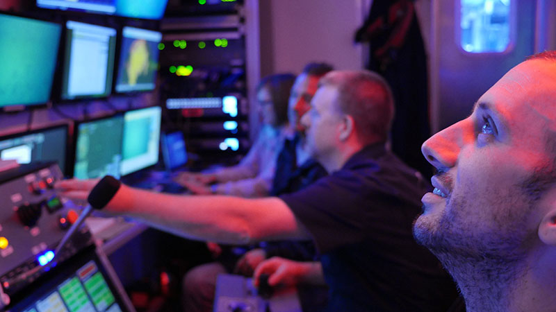 Left to right: Katharine Coykendall (U.S. Geological Survey), Paul Sanacore (Pelagic Research Services), Jesse Doren (Pelagic Research Services), and Jonathan Gallant (Pelagic Research Services/Terra Remote Sensing, Inc.) controlling ROV operations aboard NOAA Ship Nancy Foster.