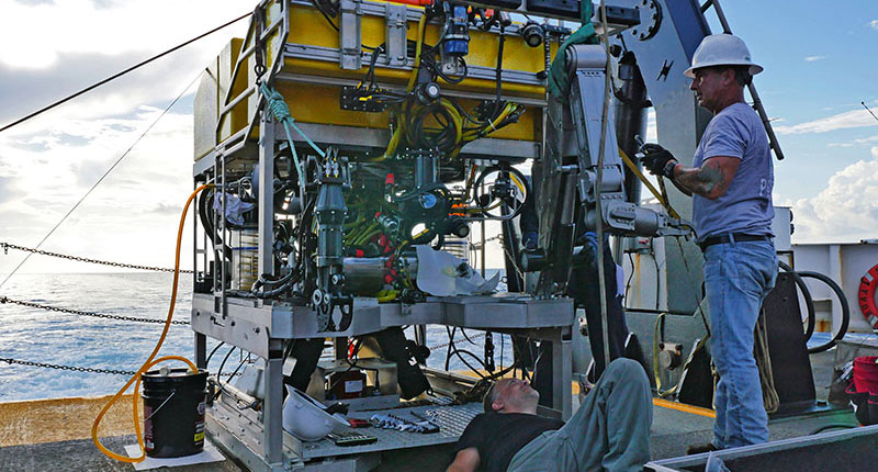 ROV pilot and engineers Kris Ingram and Paul SanAcore preparing ROV Odysseus for a dive on the West Florida slope.