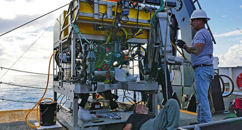 ROV pilot and engineers Kris Ingram and Paul SanAcore preparing ROV Odysseus for a dive on the West Florida slope.