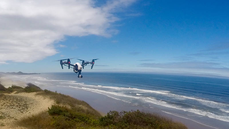 Example of camera-equipped quadcopter UAS system in flight.