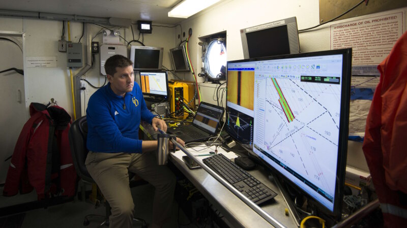Dr. Art Trembanis of the University of Delaware oversees exploratory survey operations in May, 2017. The university partnered with Thunder Bay National Marine Sanctuary to operate an EdgeTech 6205 Bathymetric Side Scan Sonar from NOAA vessel R8001 and completed nearly 100 square miles of acoustic scanning off Presque Isle, Michigan. During the course of this survey, two new shipwreck locations were identified and marked for further investigation throughout the summer of 2017Northwestern Michigan College/Thunder Bay National Marine Sanctuary.