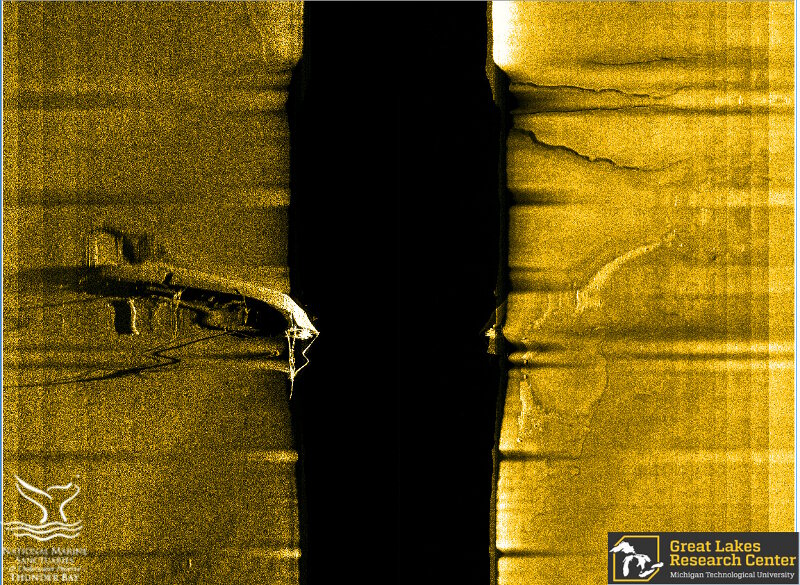 Labelled ‘Target 1’ when located in May, 2017, this site required additional survey before a more complete assessment was made. This sonar image, gathered in June, was produced by an AUV running perpendicular to the vessel’s bow. Intact masts and rigging are shown, as well as the round funnel, separated from the vessel’s stern cabin, are shown, as well as the hole in the vessel’s port quarter. This is tell-tale evidence of a collision.