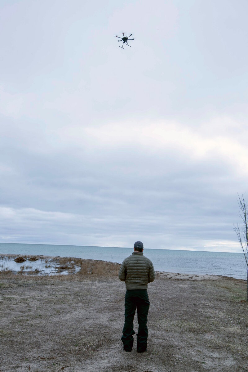 Pilot J.R. Gibbens pilots Trumball Unamnned’s DJI Matrice 600 Pro over Thunder Bay National Marine Sanctuary in the vicinity of Black River.