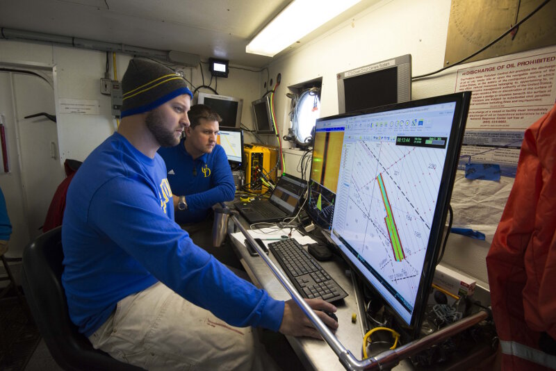 Co-Principal Investigator Dr. Art Trembanis sits watch with University of Delaware doctoral student Carter DuVal.