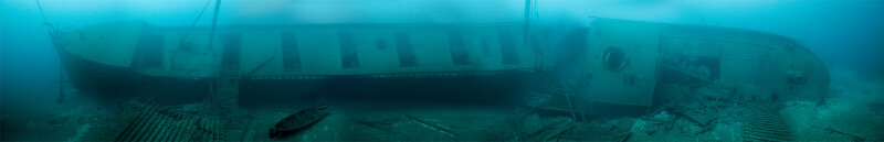 A 2D photomosaic showing the profile view from one side of Norman’s remains. The vessel is 296 feet long and looms large off the lake bottom.