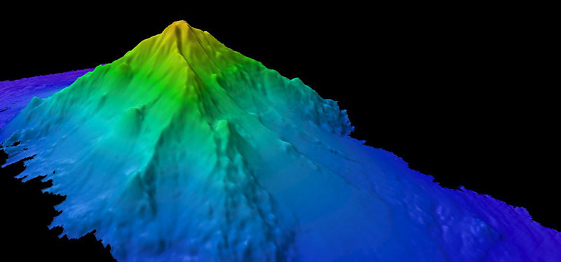 A previously unmapped seamount we are calling 'Kahalewai.' This seamount has four ridges that radiate outward from the center. This ~4,200-meter (~13,800-foot) high seamount was almost 1,000 meters taller than previously thought.